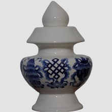 Blue Eight Auspicious Symbols relief on White Treasure Vase
