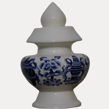 Blue Eight Auspicious Symbols relief on White Treasure Vase
