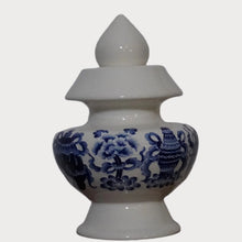 Blue Eight Auspicious Symbols relief on White Treasure Vase